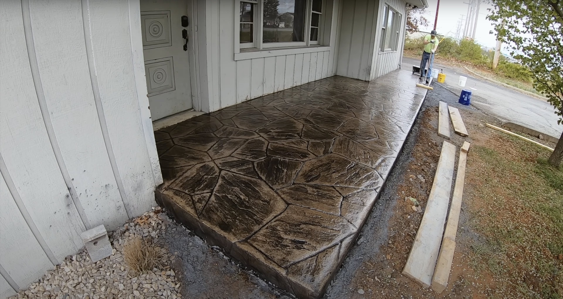 Stamped concrete patio and walkway with stone pattern design