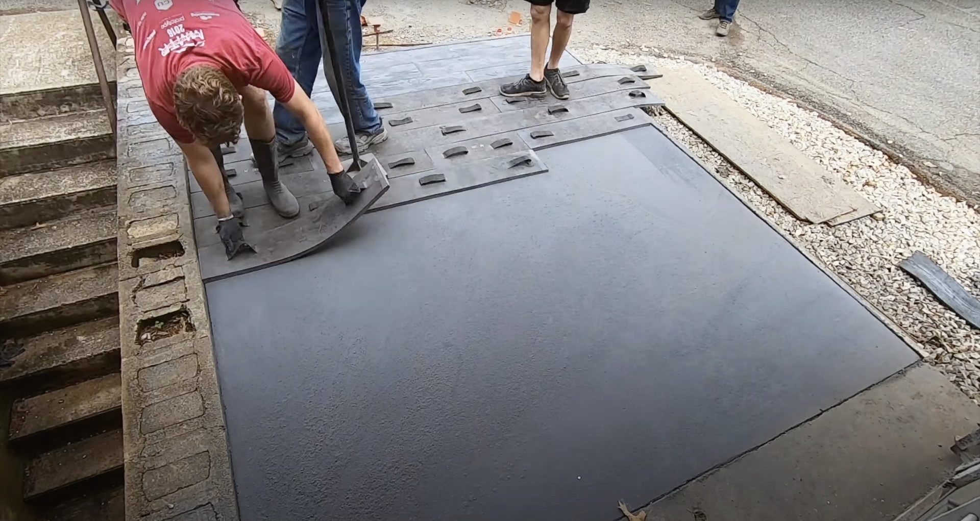 Concrete resurfacing work showing repair and finishing process
