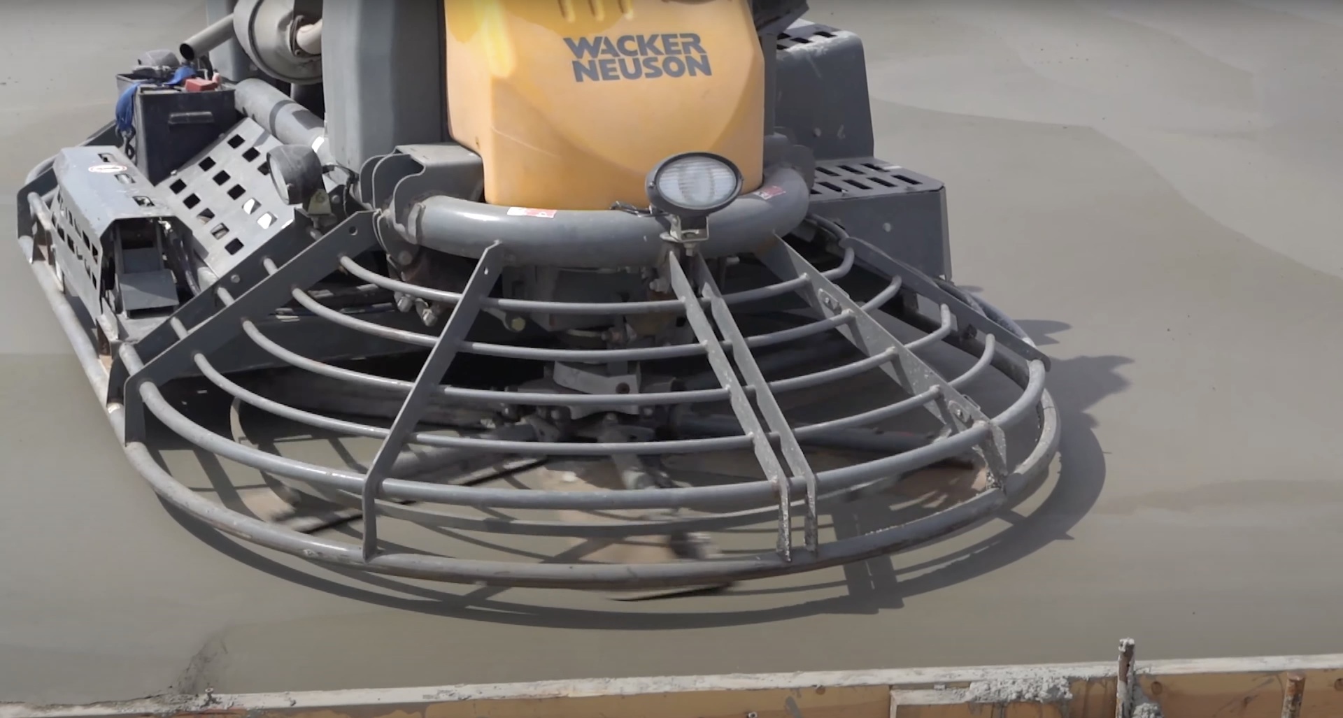 Commercial concrete floor finishing Evans Colorado Power trowel finishing commercial concrete floor
